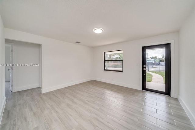2447 Fletcher St, Hollywood, FL 33020 - unfurnished room featuring light wood-type flooring and baseboards