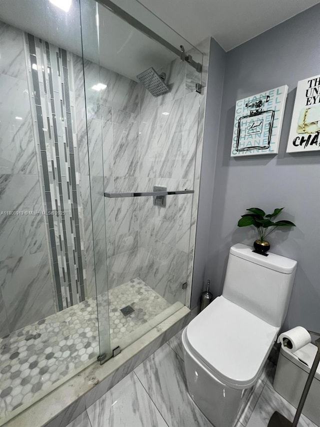 4550 NW 79th Ave Unit 1D, Doral, FL 33166 - bathroom featuring a marble finish shower, toilet, and marble finish floors