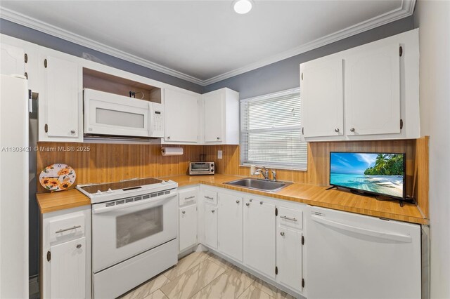 9401 Sunrise Lakes Blvd Unit 307, Sunrise, FL 33322 - kitchen featuring white appliances, a sink, light countertops, white cabinetry, and crown molding