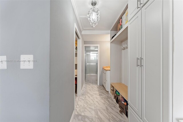 9401 Sunrise Lakes Blvd Unit 307, Sunrise, FL 33322 - mudroom featuring light marble finish floors and ornamental molding