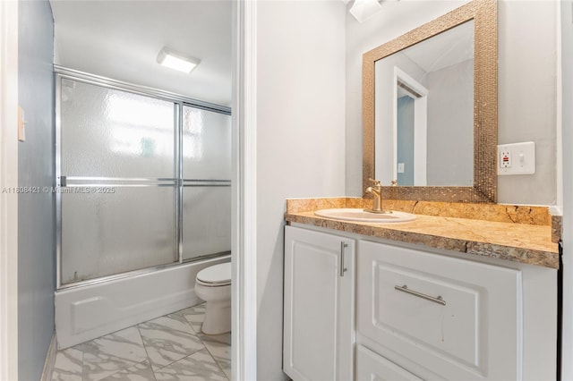 9401 Sunrise Lakes Blvd Unit 307, Sunrise, FL 33322 - full bathroom with marble finish floors, vanity, toilet, and bath / shower combo with glass door