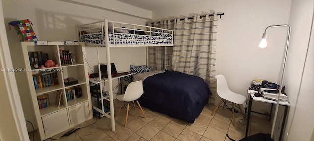 771 NE 199th St Unit 103, Miami, FL 33179 - bedroom featuring tile patterned flooring