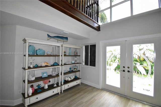 168 Indian Mound Trl, Tavernier, FL 33070 - entryway featuring baseboards, french doors, and wood finished floors