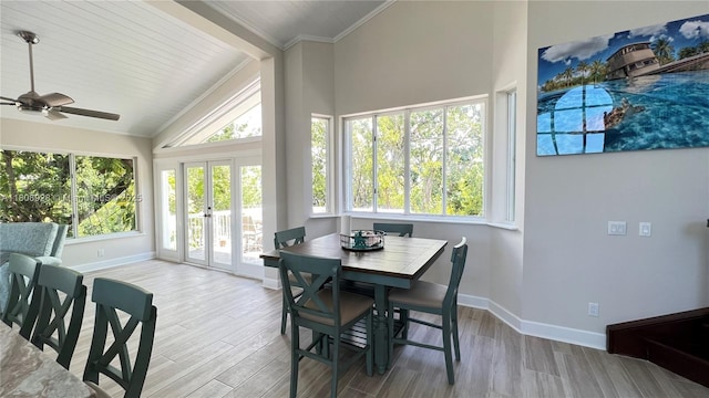 168 Indian Mound Trl, Tavernier, FL 33070 - dining room featuring baseboards, high vaulted ceiling, french doors, wood finished floors, and a ceiling fan