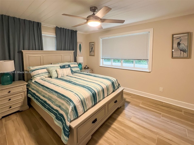 168 Indian Mound Trl, Tavernier, FL 33070 - bedroom featuring light wood-style flooring, baseboards, and a ceiling fan