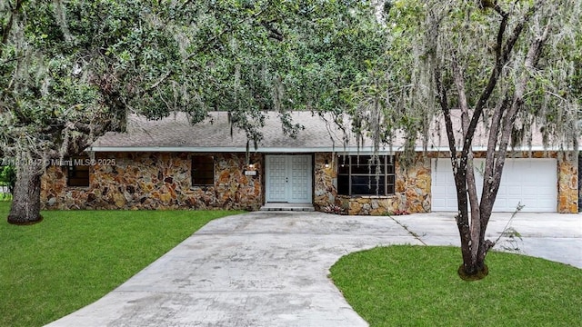 2141 Oak Breach Blvd, Sebring, FL 33875 - view of front facade featuring stone siding, concrete driveway, a front yard, and a shingled roof