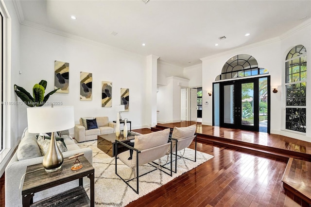 169 Dockside Cir, Weston, FL 33327 - living area featuring hardwood / wood-style flooring, crown molding, recessed lighting, and baseboards