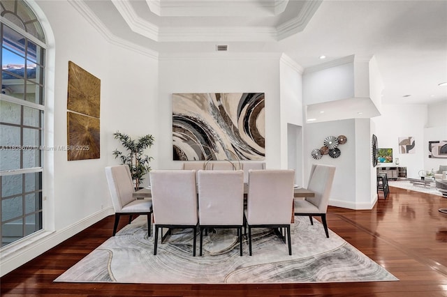169 Dockside Cir, Weston, FL 33327 - dining space featuring crown molding, wood finished floors, baseboards, and a raised ceiling