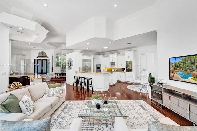 169 Dockside Cir, Weston, FL 33327 - living area with dark wood-style floors, ornamental molding, and recessed lighting