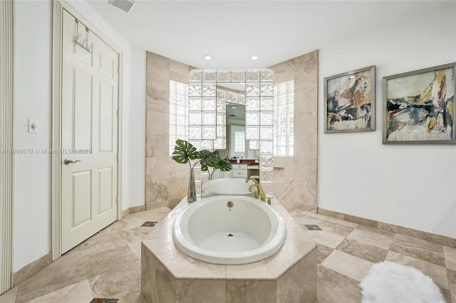 169 Dockside Cir, Weston, FL 33327 - full bathroom with a garden tub, vanity, and baseboards