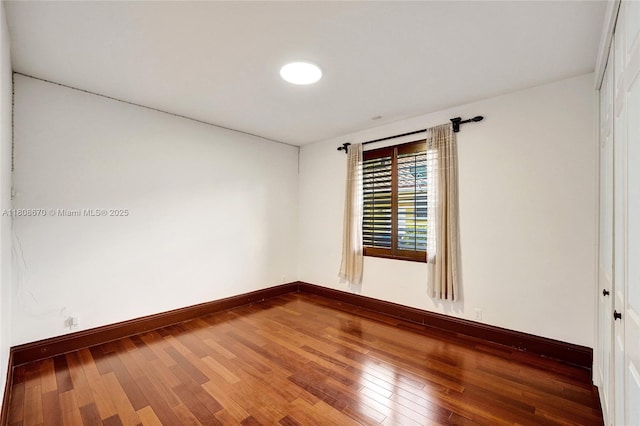 169 Dockside Cir, Weston, FL 33327 - empty room featuring baseboards and wood-type flooring