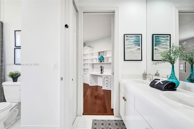 169 Dockside Cir, Weston, FL 33327 - bathroom featuring double vanity, toilet, a closet, and tile patterned flooring