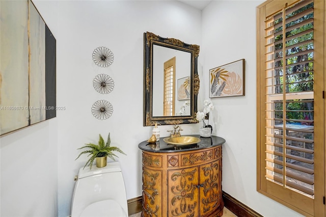 169 Dockside Cir, Weston, FL 33327 - bathroom with vanity, toilet, and baseboards