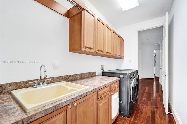 169 Dockside Cir, Weston, FL 33327 - laundry area featuring independent washer and dryer, dark wood-style floors, and cabinet space