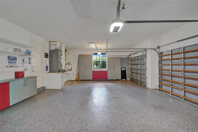 169 Dockside Cir, Weston, FL 33327 - garage featuring a garage door opener and heating unit