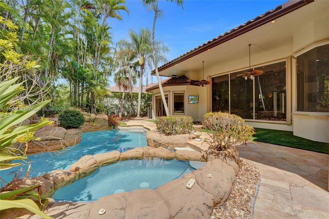 169 Dockside Cir, Weston, FL 33327 - view of swimming pool with a patio area and a pool with connected hot tub