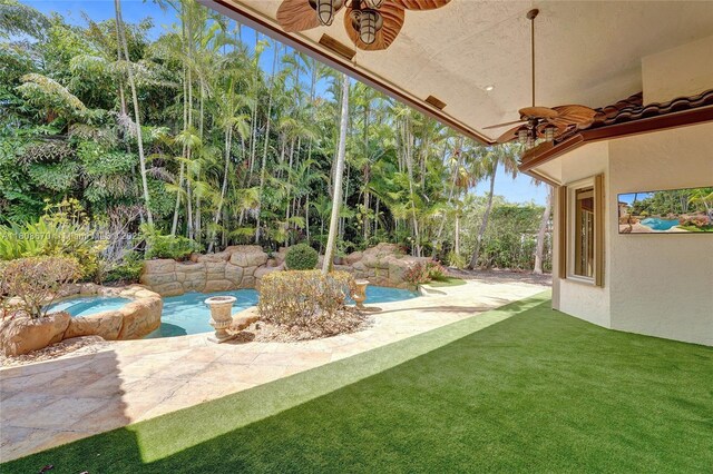 169 Dockside Cir, Weston, FL 33327 - view of patio / terrace with ceiling fan and an in-ground hot tub