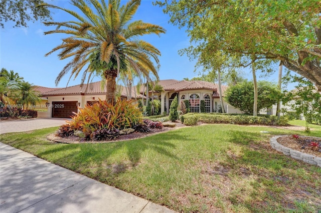 169 Dockside Cir, Weston, FL 33327 - mediterranean / spanish home with a tiled roof, driveway, a front yard, and stucco siding