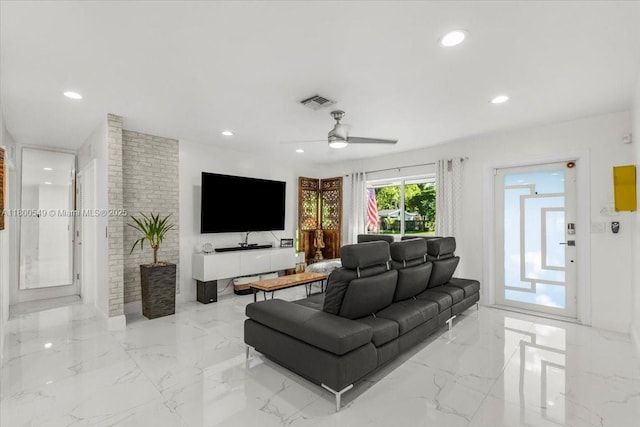 4340 NW 19th Ave, Oakland Park, FL 33309 - living room with ceiling fan, marble tiled flooring, and recessed lighting