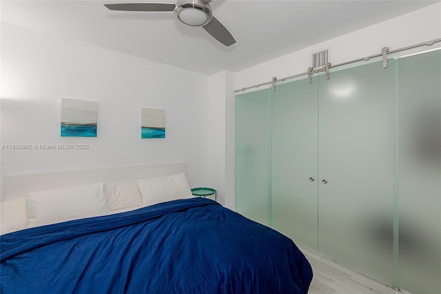1830 S Ocean Dr Unit 1605, Hallandale Beach, FL 33009 - bedroom with wood finished floors, a ceiling fan, and a closet