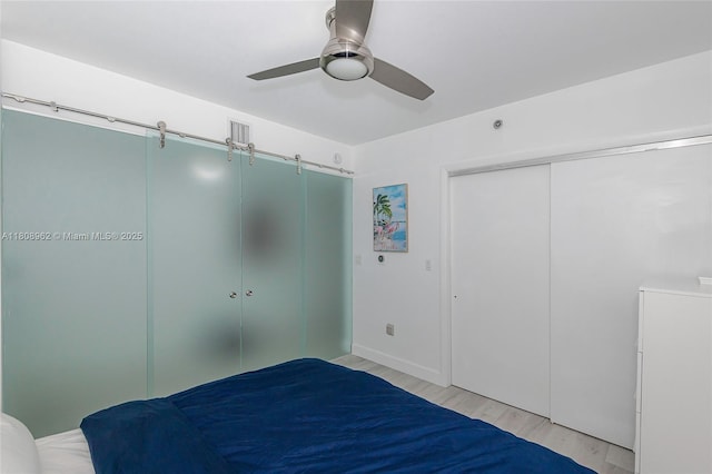 1830 S Ocean Dr Unit 1605, Hallandale Beach, FL 33009 - unfurnished bedroom with light wood-style floors, ceiling fan, and a closet