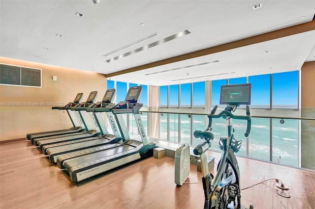 1830 S Ocean Dr Unit 1605, Hallandale Beach, FL 33009 - exercise room with floor to ceiling windows and wood finished floors