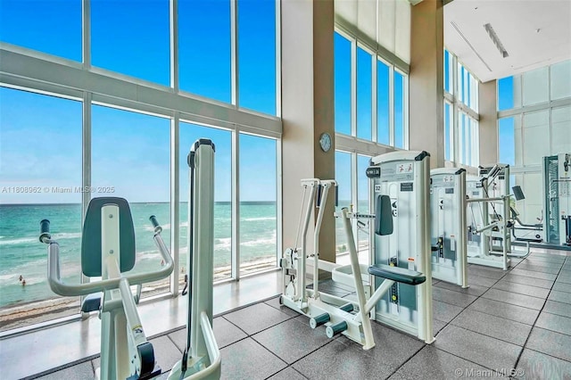 1830 S Ocean Dr Unit 1605, Hallandale Beach, FL 33009 - exercise room featuring a water view and a high ceiling