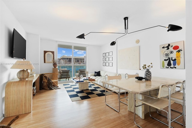 2101 Brickell Ave Unit 1702, Miami, FL 33129 - dining room featuring wood finished floors