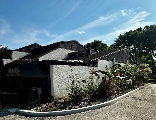 3601 SW 68th Way, Miramar, FL 33023 - view of side of property featuring central AC unit