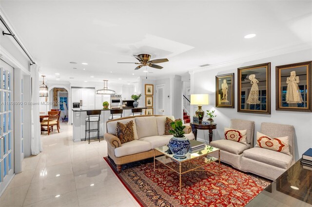 7360 SW 164th St, Palmetto Bay, FL 33157 - living room featuring recessed lighting, a ceiling fan, ornamental molding, and arched walkways