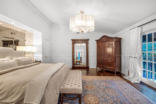 7360 SW 164th St, Palmetto Bay, FL 33157 - bedroom with a chandelier, dark wood-style flooring, ornamental molding, a wainscoted wall, and a decorative wall