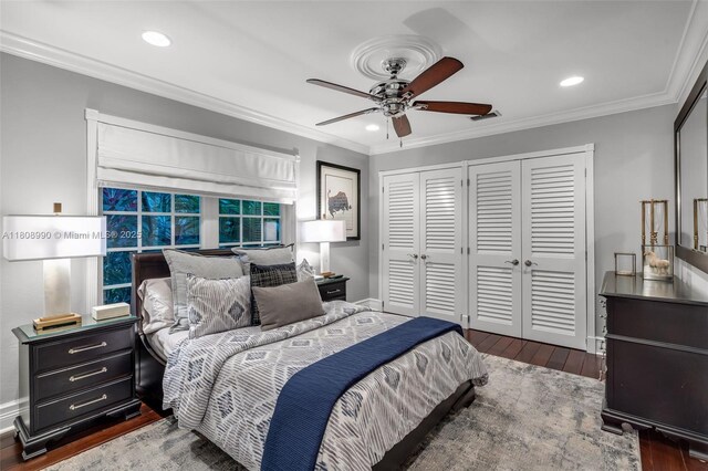 7360 SW 164th St, Palmetto Bay, FL 33157 - bedroom featuring multiple closets, dark wood-type flooring, recessed lighting, ornamental molding, and ceiling fan
