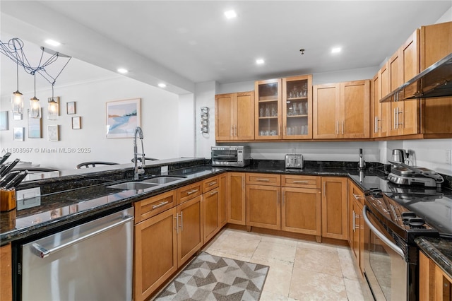 201 Crandon Blvd Unit 1030, Key Biscayne, FL 33149 - kitchen featuring appliances with stainless steel finishes, a sink, wall chimney range hood, recessed lighting, and dark stone countertops