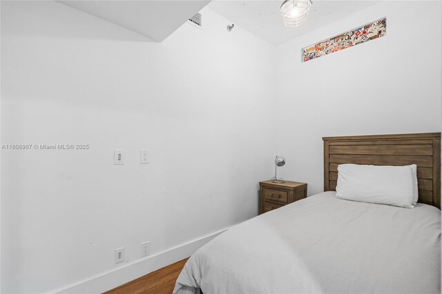 201 Crandon Blvd Unit 1030, Key Biscayne, FL 33149 - bedroom featuring wood finished floors and baseboards