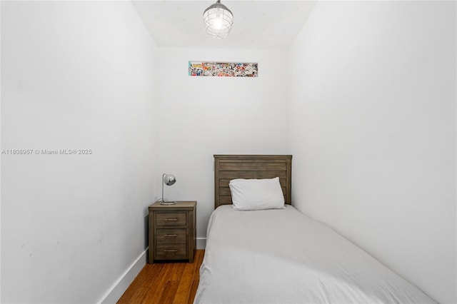 201 Crandon Blvd Unit 1030, Key Biscayne, FL 33149 - bedroom featuring wood finished floors and baseboards