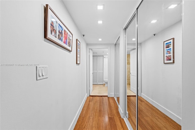 201 Crandon Blvd Unit 1030, Key Biscayne, FL 33149 - corridor featuring light wood finished floors, baseboards, and recessed lighting