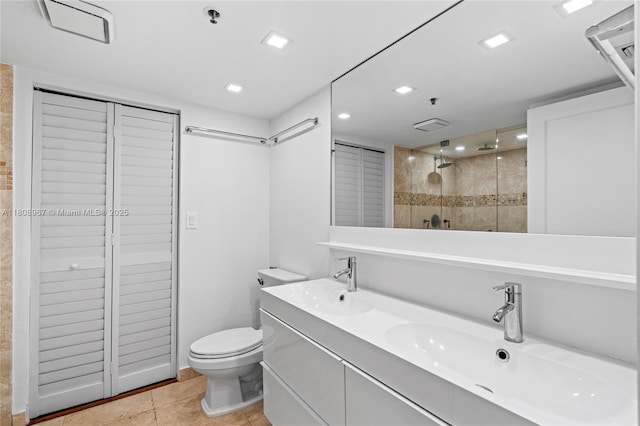 201 Crandon Blvd Unit 1030, Key Biscayne, FL 33149 - bathroom with a closet, tiled shower, double vanity, toilet, and tile patterned floors