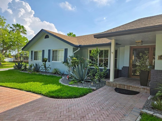 14870 SW 152nd Ct, Miami, FL 33196 - ranch-style house featuring stucco siding, a front yard, and roof with shingles