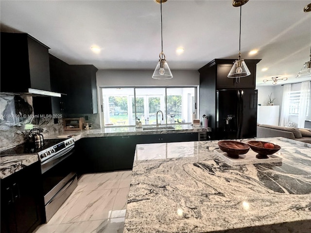 14870 SW 152nd Ct, Miami, FL 33196 - kitchen with black fridge with ice dispenser, stainless steel range with electric cooktop, a sink, dark cabinetry, and recessed lighting