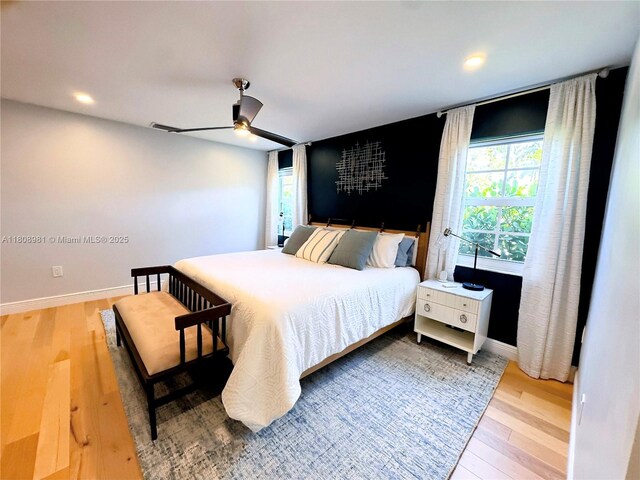 14870 SW 152nd Ct, Miami, FL 33196 - bedroom with wood finished floors, baseboards, a ceiling fan, and recessed lighting