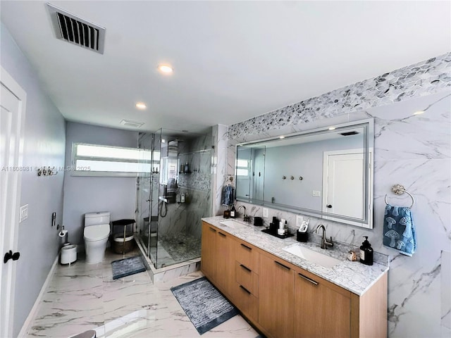 14870 SW 152nd Ct, Miami, FL 33196 - bathroom with double vanity, marble finish flooring, toilet, a marble finish shower, and recessed lighting