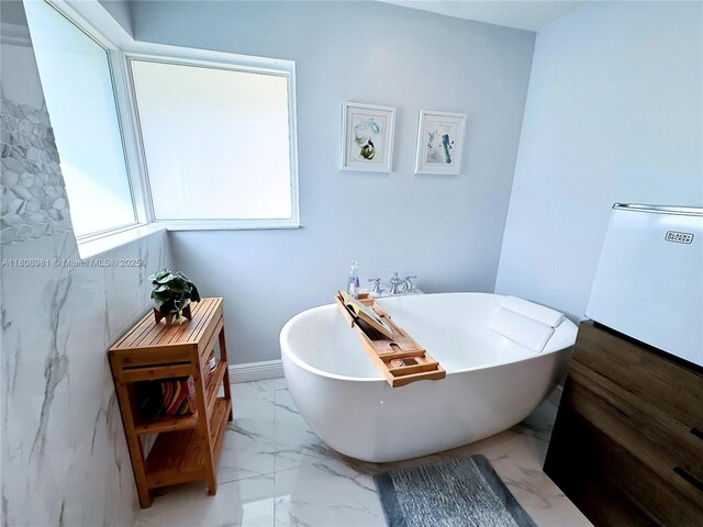 14870 SW 152nd Ct, Miami, FL 33196 - full bath with a soaking tub and marble look tile flooring