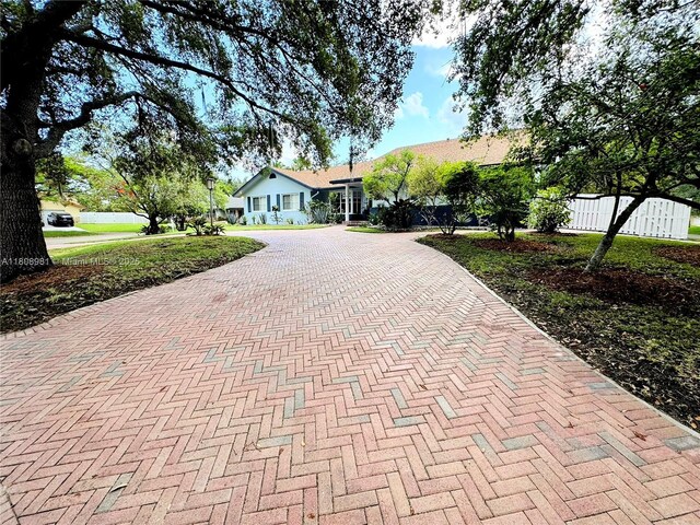 14870 SW 152nd Ct, Miami, FL 33196 - single story home featuring decorative driveway