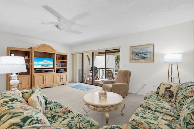 601 W Ocean Dr Dr Unit 411C, Key Colony, FL 33051 - living room with light carpet, ceiling fan, a textured ceiling, and baseboards