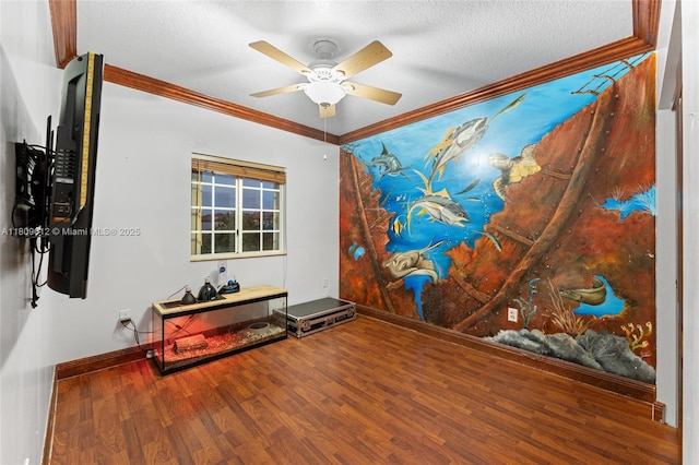 16526 SW 51st Ter, Miami, FL 33185 - empty room featuring crown molding, wood finished floors, ceiling fan, a textured ceiling, and baseboards