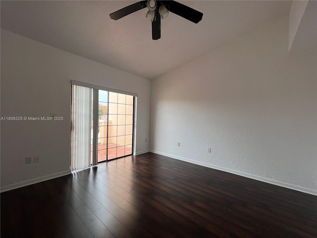 20820 San Simeon Way Unit 24-G, Miami, FL 33179 - unfurnished room with dark wood-style floors, a ceiling fan, baseboards, and lofted ceiling