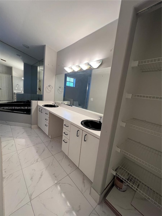 20820 San Simeon Way Unit 24-G, Miami, FL 33179 - bathroom with vanity and marble look tile flooring