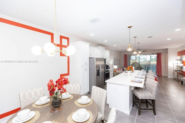 1515 Carey Palm Cir, Kissimmee, FL 34747 - dining space featuring tile patterned flooring, ceiling fan, recessed lighting, and baseboards