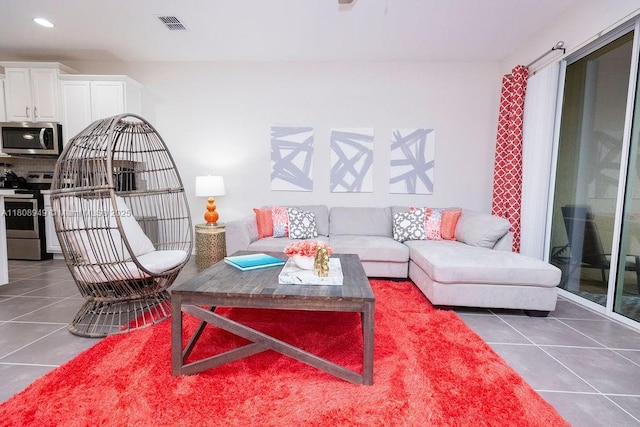 1515 Carey Palm Cir, Kissimmee, FL 34747 - living area with tile patterned floors and recessed lighting