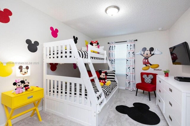 1515 Carey Palm Cir, Kissimmee, FL 34747 - bedroom featuring light carpet, a textured ceiling, and baseboards